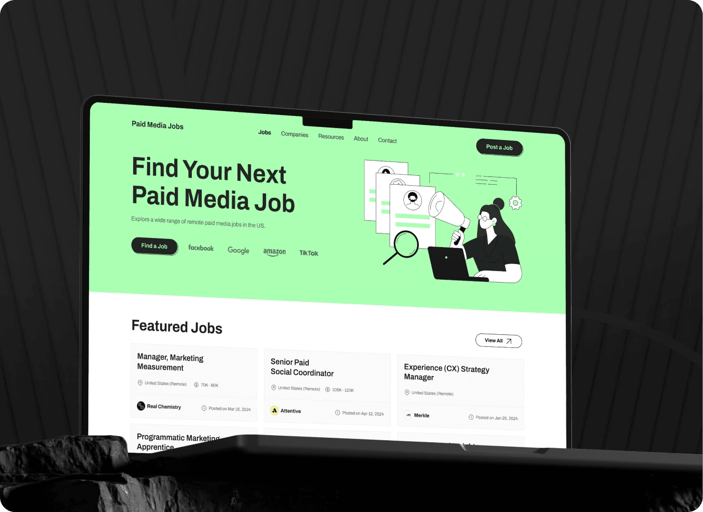 Paid Media Jobs website on a laptop: Find Your Next Paid Media Job
